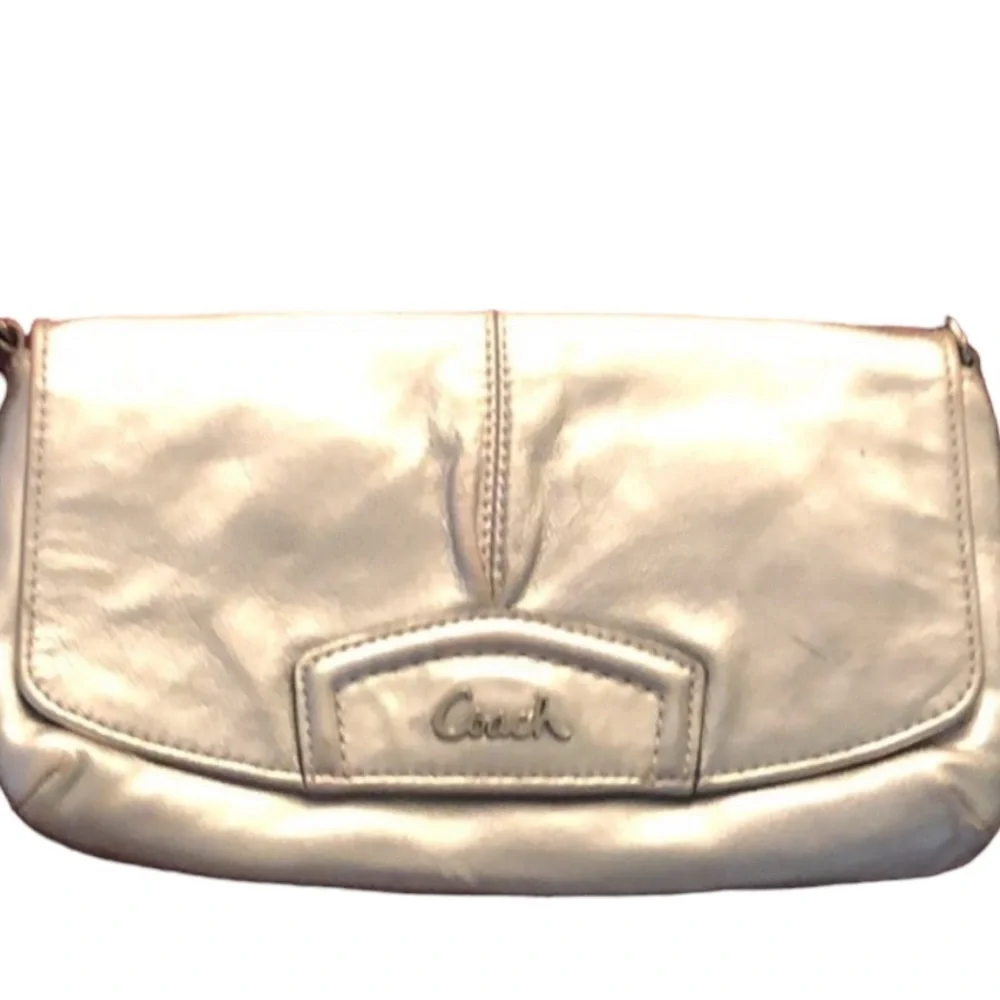 Coach  silver metallic genuine leather large wristlet or clutch 9” long  …